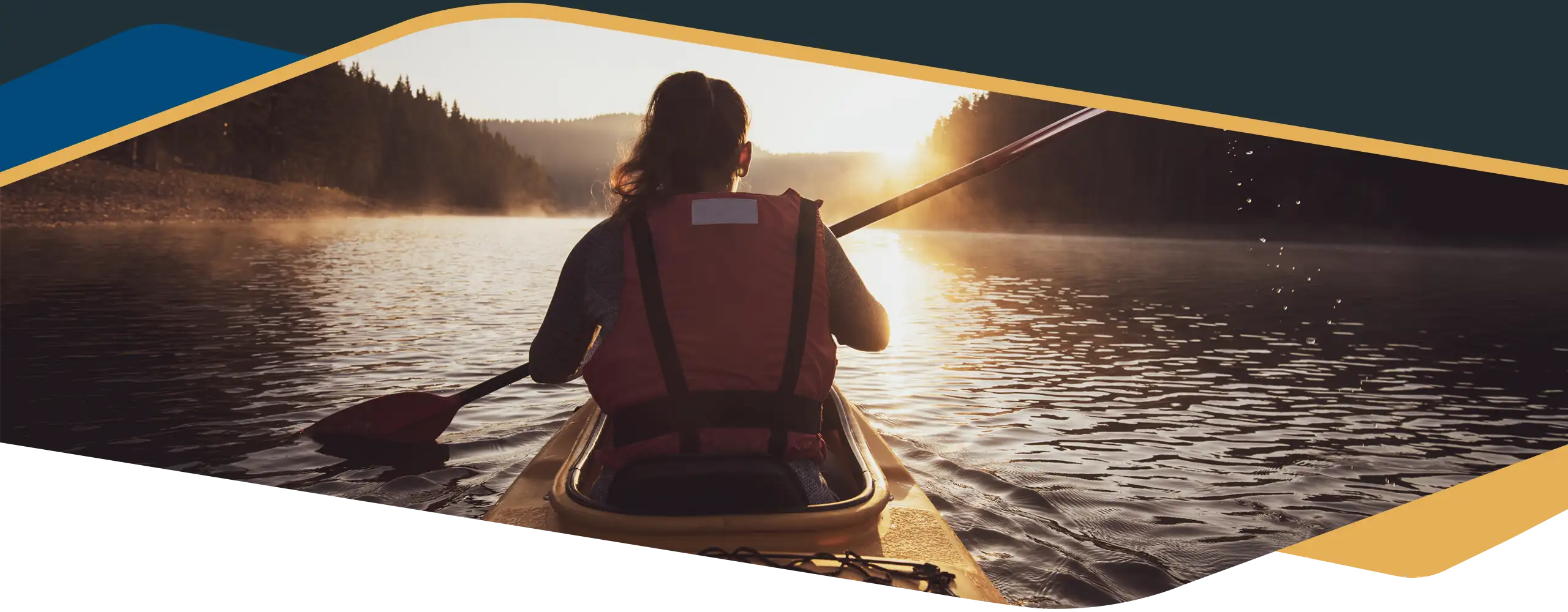 Chiropractic Wasilla AK HP Lake Woman kayaking, paddling on a beautiful lake